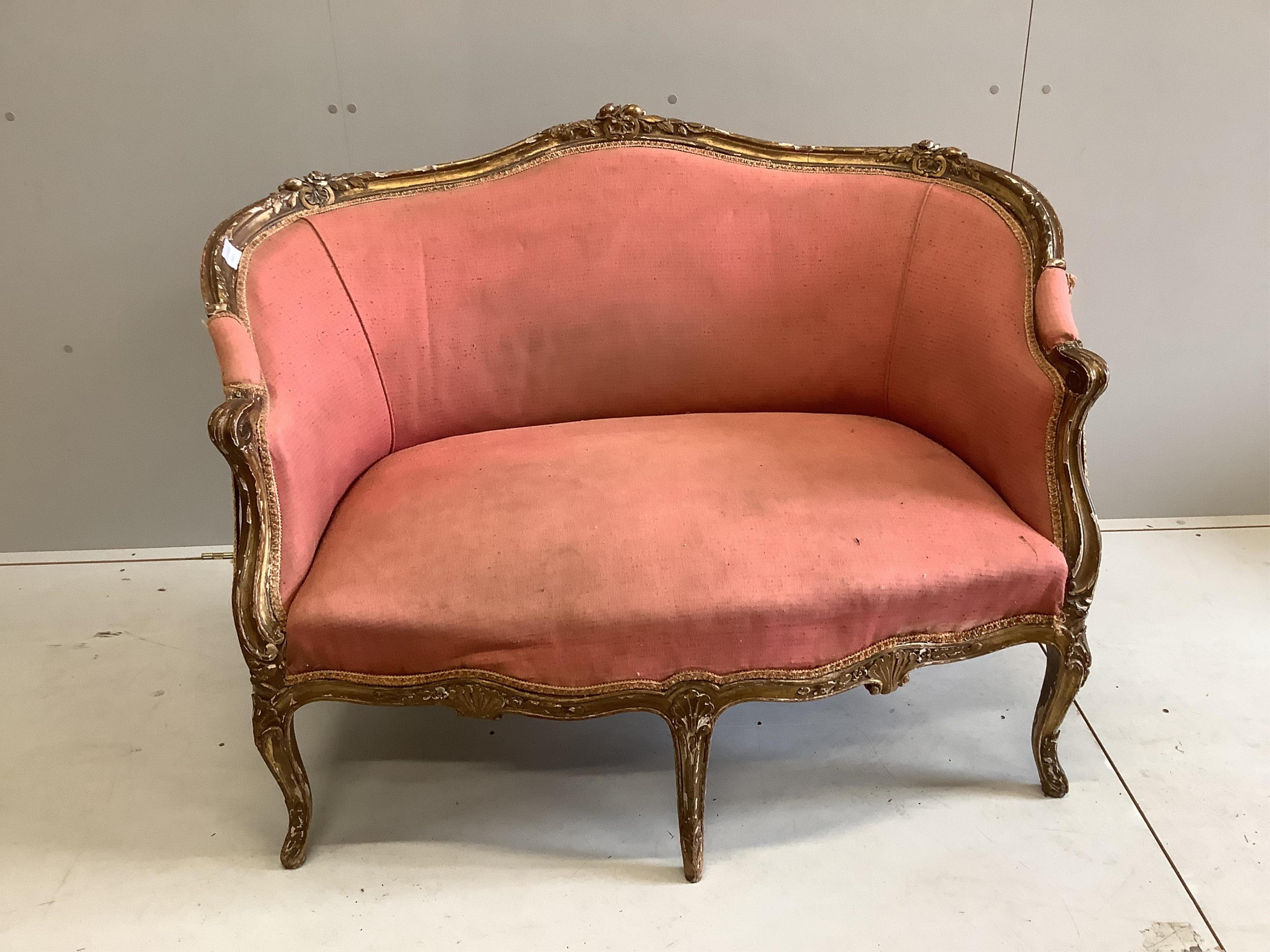 A French giltwood and composition settee, width 126cm, depth 60cm, height 91cm. Condition - fair